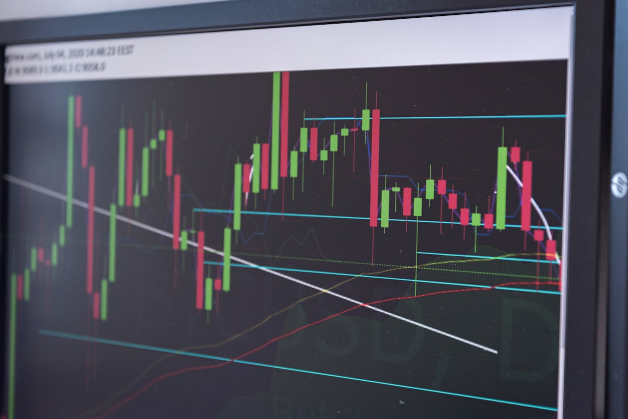 A close-up view of a cryptocurrency trading chart displayed on a monitor, showcasing market trends.